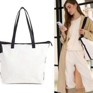 NWT - Walter Baker x
Curateur Carly Canvas Tote
Bag